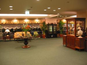a store with a table in the middle of a room at Hotel Grand Terrace Sendai Kokubun-cho in Sendai
