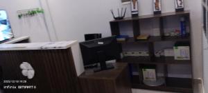 Et tv og/eller underholdning på Résidence Flowers House