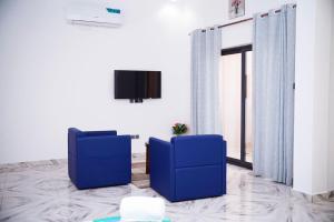 Et tv og/eller underholdning på Résidence Flowers House