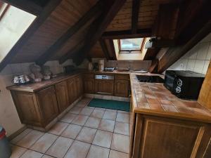 Køkken eller tekøkken på appartement le petit chalet sauna