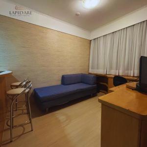 Μια τηλεόραση ή/και κέντρο ψυχαγωγίας στο Flat Studio Suites Hotel Comfo Alphaville