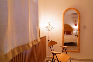 Ένα ή περισσότερα κρεβάτια σε δωμάτιο στο Casa Amma - Amma