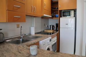 Køkken eller tekøkken på Apartment with balcony, Cabo Roig, La Rotonda