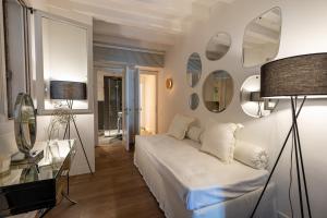 En eller flere senge i et værelse på Ca' Luce Canal Grande