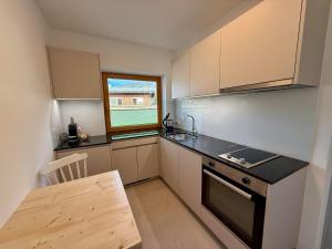 Kuchyň nebo kuchyňský kout v ubytování Bergnest Appartements + 20 fotografií