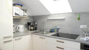 Køkken eller tekøkken på 2-Raum Ferienwohnung "Am Dorfbach" + 12 billeder