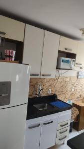 Nhà bếp/bếp nhỏ tại Pouso Nobre São Luís +3 ảnh