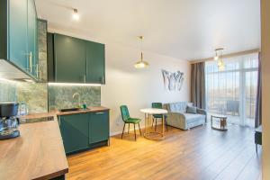 Kuchyň nebo kuchyňský kout v ubytování Apartament Emerald Gold przy plaży - Darmowy Parking
