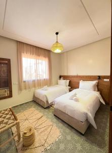 Ένα ή περισσότερα κρεβάτια σε δωμάτιο στο Paradise Blue Wave Hostel - Guest House +26 φωτογραφίες