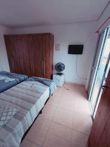 Postel nebo postele na pokoji v ubytování Pousada Beach Porto Novo