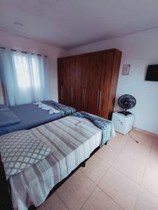 Postel nebo postele na pokoji v ubytování Pousada Beach Porto Novo