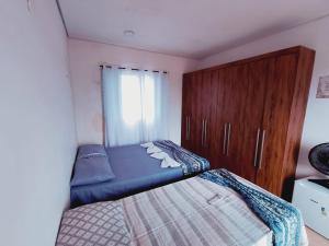 Postel nebo postele na pokoji v ubytování Pousada Beach Porto Novo