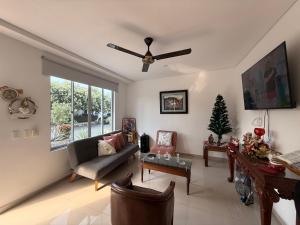 TV a/nebo společenská místnost v ubytování Casa condominio Dubai Flandes