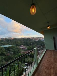 a balcony with a view of a city at Humble abode Homestay 1BHK with scenic view in Itānagar