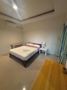 En eller flere senge i et værelse på Little Bailan Retreat - Jungle Escape