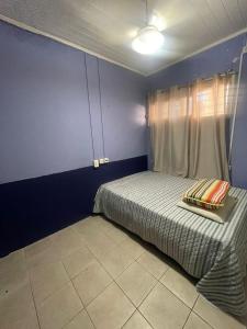 En eller flere senge i et værelse på Casa na praia de Capão da Canoa + 4 billeder