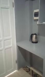 Køkken eller tekøkken på Casa Dwayne room 102