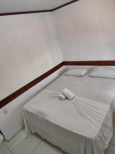 En eller flere senge i et værelse på Saudade de Morro