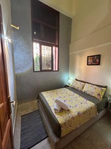 Ένα ή περισσότερα κρεβάτια σε δωμάτιο στο Gueliz Appartement