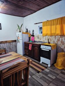 Kuchyň nebo kuchyňský kout v ubytování Alojamiento Nobili