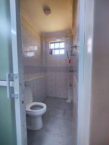 Et badeværelse på Camellia Homes + 9 billeder