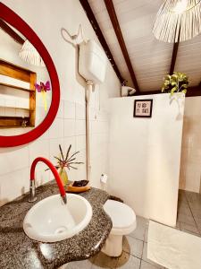 Et badeværelse på Casa Saravá na Pousada Ziriguidüm + 12 billeder