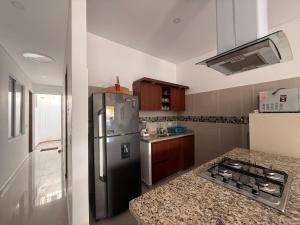 Kuchyň nebo kuchyňský kout v ubytování Casa condominio Dubai Flandes