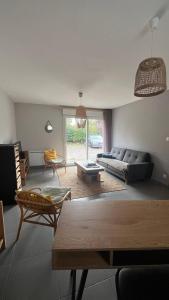 Et opholdsområde på Les Buissonnets - Gîte rural - Calme & Nature, proche Caps & Tunnel