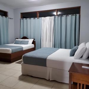 Ένα ή περισσότερα κρεβάτια σε δωμάτιο στο Hidden Secret