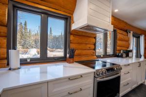 Kuchyň nebo kuchyňský kout v ubytování Spa & Pool table - Le Massif