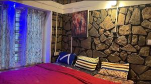 En eller flere senge i et værelse på Stone Villa Vagamon