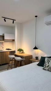 Postel nebo postele na pokoji v ubytování Aparta estudio Luxury