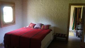 Ένα ή περισσότερα κρεβάτια σε δωμάτιο στο Pine Ridge Lodge Belize