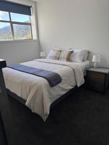 Ένα ή περισσότερα κρεβάτια σε δωμάτιο στο Modern Apartment in the heart of town