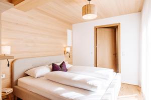 Postel nebo postele na pokoji v ubytování Gretina Appartements