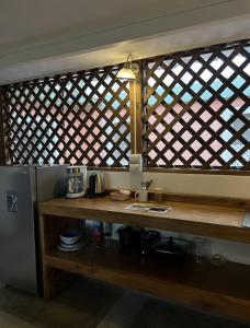 Kuchyň nebo kuchyňský kout v ubytování Bhoga Forest + 30 fotografií