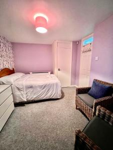 Ένα ή περισσότερα κρεβάτια σε δωμάτιο στο Mona