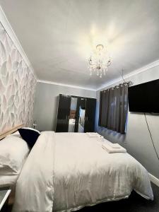 Ένα ή περισσότερα κρεβάτια σε δωμάτιο στο Mona