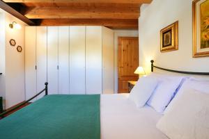 Postel nebo postele na pokoji v ubytování Gressoney House