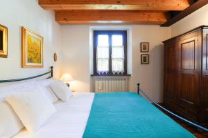 Postel nebo postele na pokoji v ubytování Gressoney House