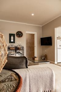 TV a/nebo společenská místnost v ubytování Kiama Tea House