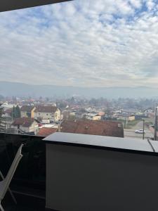 a view of a city from the roof of a building at Cozy apartment Banja Luka in Budžak