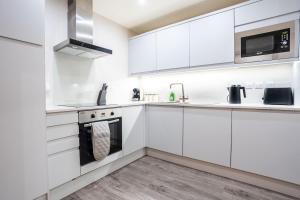 Kuchyň nebo kuchyňský kout v ubytování Stylish City-Centre Apartment - Sleeps 4 - Leeds