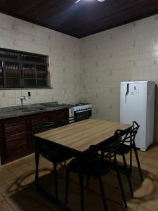 Køkken eller tekøkken på Chácara Eco Ville