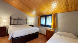 Кровать или кровати в номере Cal Crispi