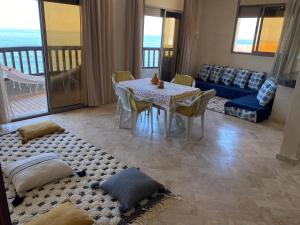 Postel nebo postele na pokoji v ubytování Hostel Mirleft