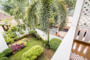 Jardín al aire libre en Tissa's Inn