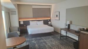 Postel nebo postele na pokoji v ubytování The Plaza Hotel Columbus at Capitol Square