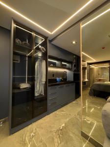 Kuchyň nebo kuchyňský kout v ubytování Flat Pé na areia com Banheira Privativa