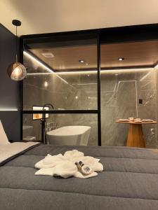 Koupelna v ubytování Flat Pé na areia com Banheira Privativa